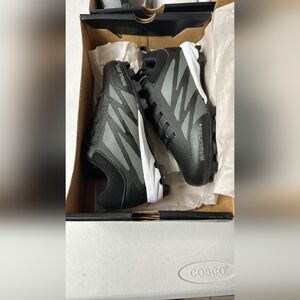 Rawlings soccer/ football cleated shoe for kids, open box